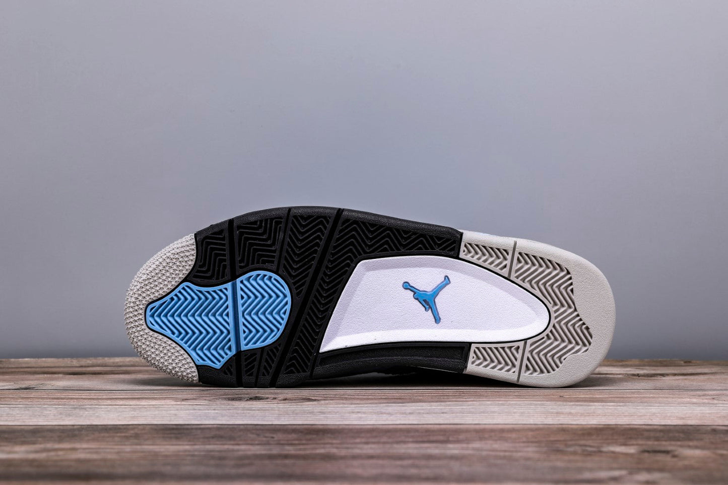 AJ 4 University Blue